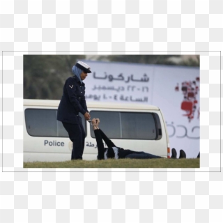 A Police Officer Drags Zainab Al-khawaja After Handcuffing - Zainab Al Khawaja Clipart